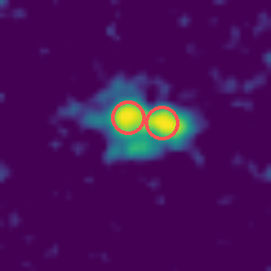 A galaxy in Hα with two bright knots, each marked with a red circle
